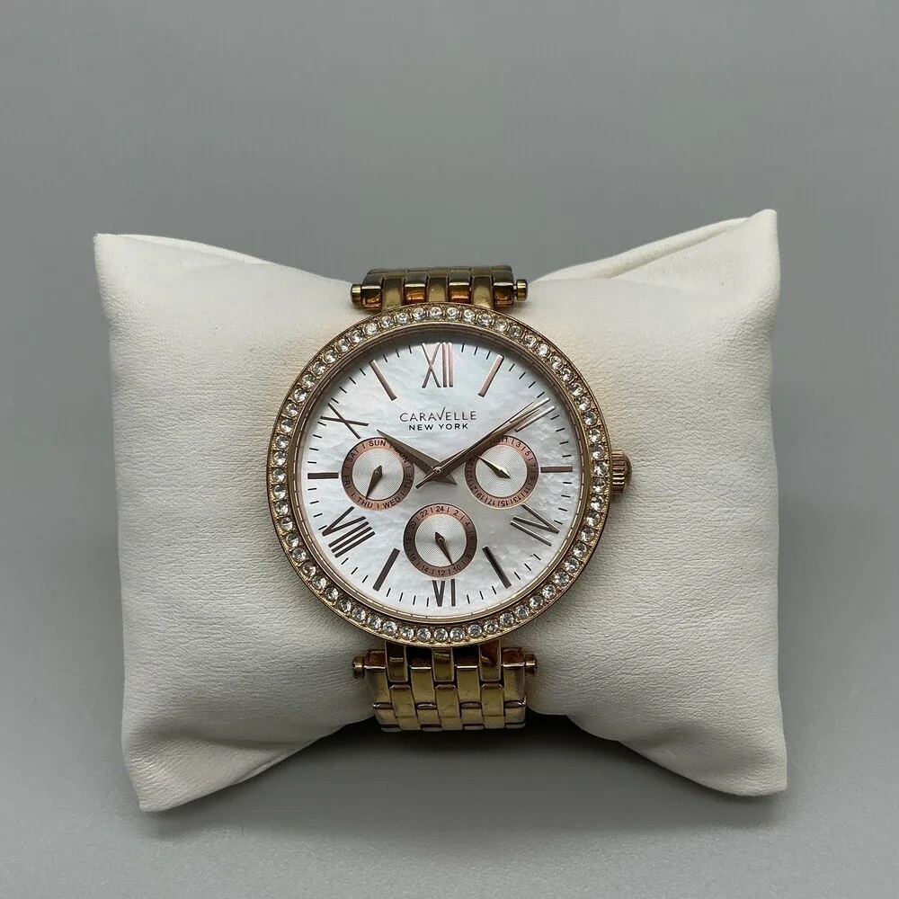 Caravelle New York Womens Watch 38mm MOP Gold Tone Day Date New Battery 5.75